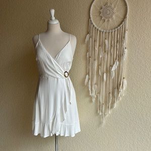 Sleeveless Side Ring Ruffle Mini Wrap Dress
Size M